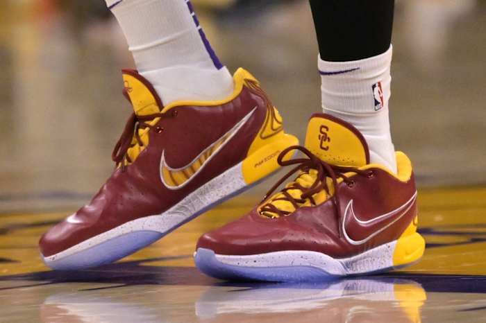LeBron James' cardinal and gold Nike sneakers.